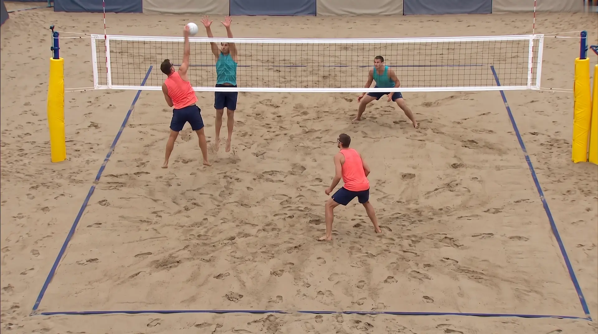 Illustration: a beach volleyball rally seen from the TV camera behind the baseline, an attack against a block at the net, with the Vision analysis overlay on the four players and the ball.
